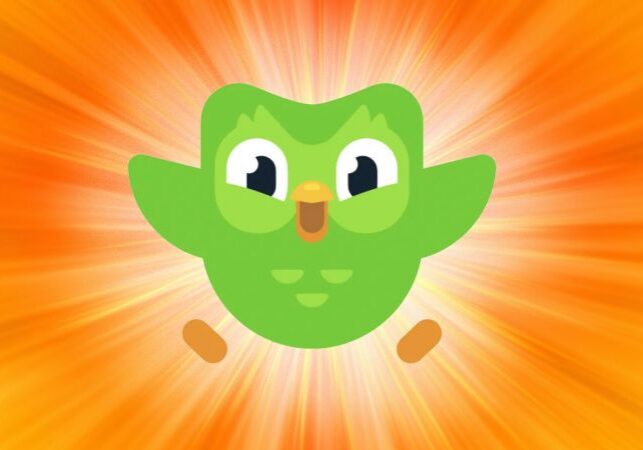 Duolingo owl mascot with radiant orange background
